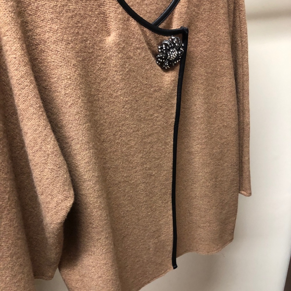 Jacket in tan boiled wool with faux leather trim!